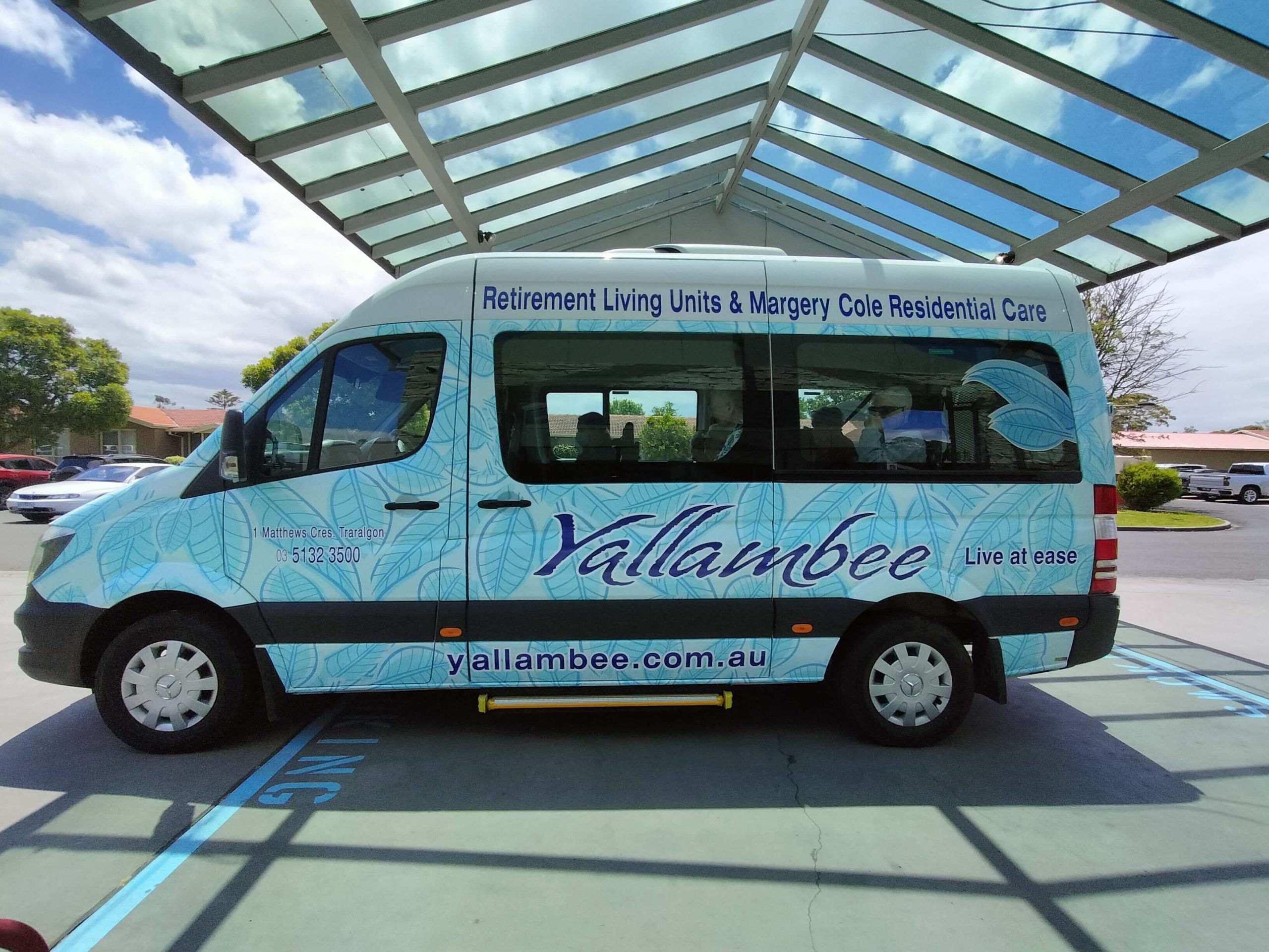 Photo of the Yallambee Aged Care mini bus with signage wrap on it.
